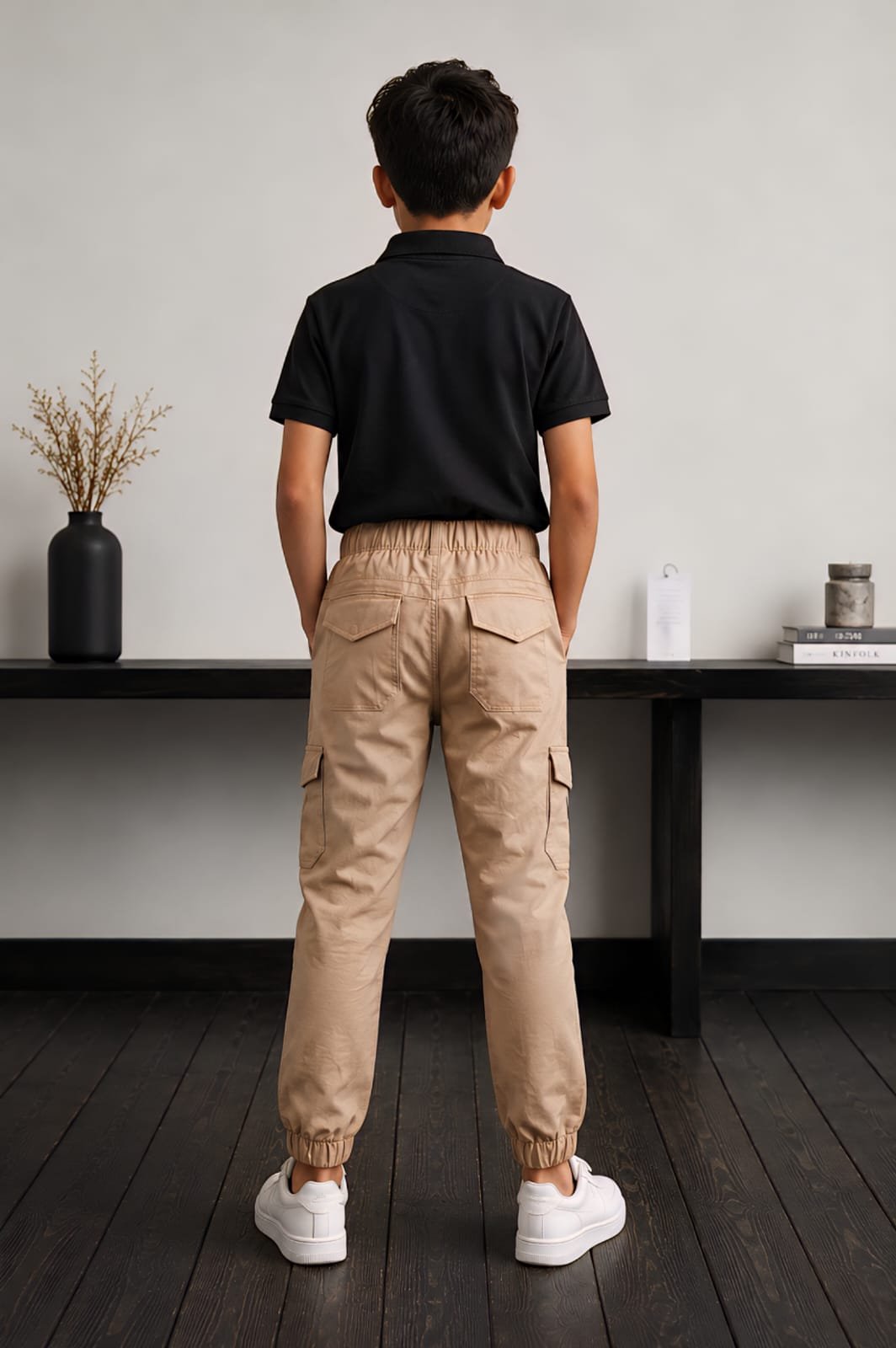 Style92 Boys Khaki Soft Cotton Jeans Cargo Trousers are designed for everyday comfort and modern style. Made from premium soft cotton jeans fabric, these trendy 6-pocket cargo trousers feature a comfortable elastic waistband with drawstring, durable stitching, and a stylish khaki finish. Perfect for casual wear, outdoor activities, travel, and party wear. Available in sizes 24 to 38, ideal for boys aged 3 to 14 years. ✔️ Premium Soft Cotton Jeans Fabric ✔️ Trendy 6 Pocket Cargo Design ✔️ Comfortable Elastic Waist with Drawstring ✔️ Soft, Breathable & Durable ✔️ Perfect for Casual, Outdoor & Party Wear ✔️ Available Sizes: 24–38 ✔️ Age Group: 3–14 Years Style92 – Premium Quality | Trendy Style | Everyday Comfort