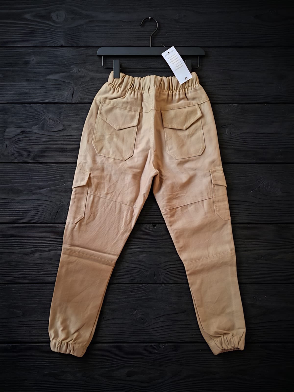 Style92 Boys Khaki Soft Cotton Jeans Cargo Trousers are designed for everyday comfort and modern style. Made from premium soft cotton jeans fabric, these trendy 6-pocket cargo trousers feature a comfortable elastic waistband with drawstring, durable stitching, and a stylish khaki finish. Perfect for casual wear, outdoor activities, travel, and party wear. Available in sizes 24 to 38, ideal for boys aged 3 to 14 years. ✔️ Premium Soft Cotton Jeans Fabric ✔️ Trendy 6 Pocket Cargo Design ✔️ Comfortable Elastic Waist with Drawstring ✔️ Soft, Breathable & Durable ✔️ Perfect for Casual, Outdoor & Party Wear ✔️ Available Sizes: 24–38 ✔️ Age Group: 3–14 Years Style92 – Premium Quality | Trendy Style | Everyday Comfort